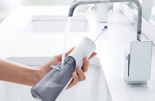 Are Waterpiks Better Than Dental Floss?