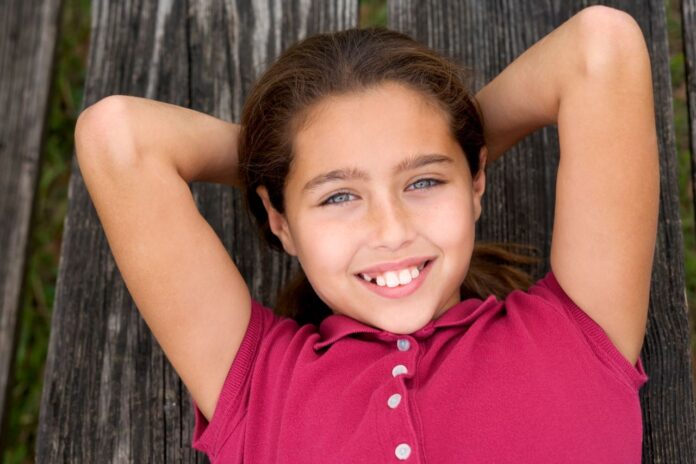 pexels-zaid-isaac-125802287-10044887 teen smile